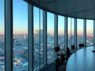 Conference room with city view representing secure event networking.