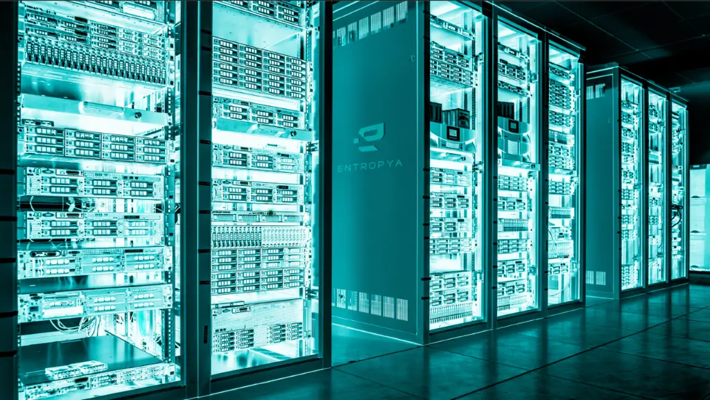 Row of illuminated server racks representing Entropya's secure infrastructure for data protection